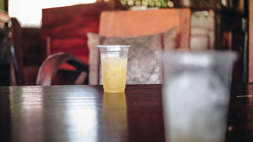 Close-up of beer glass on table at restaurant