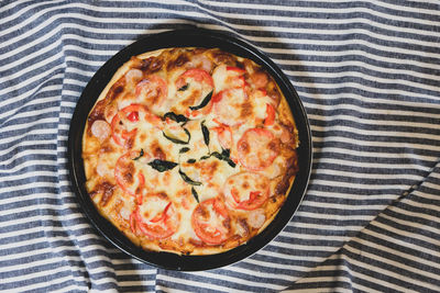 High angle view of pizza on table