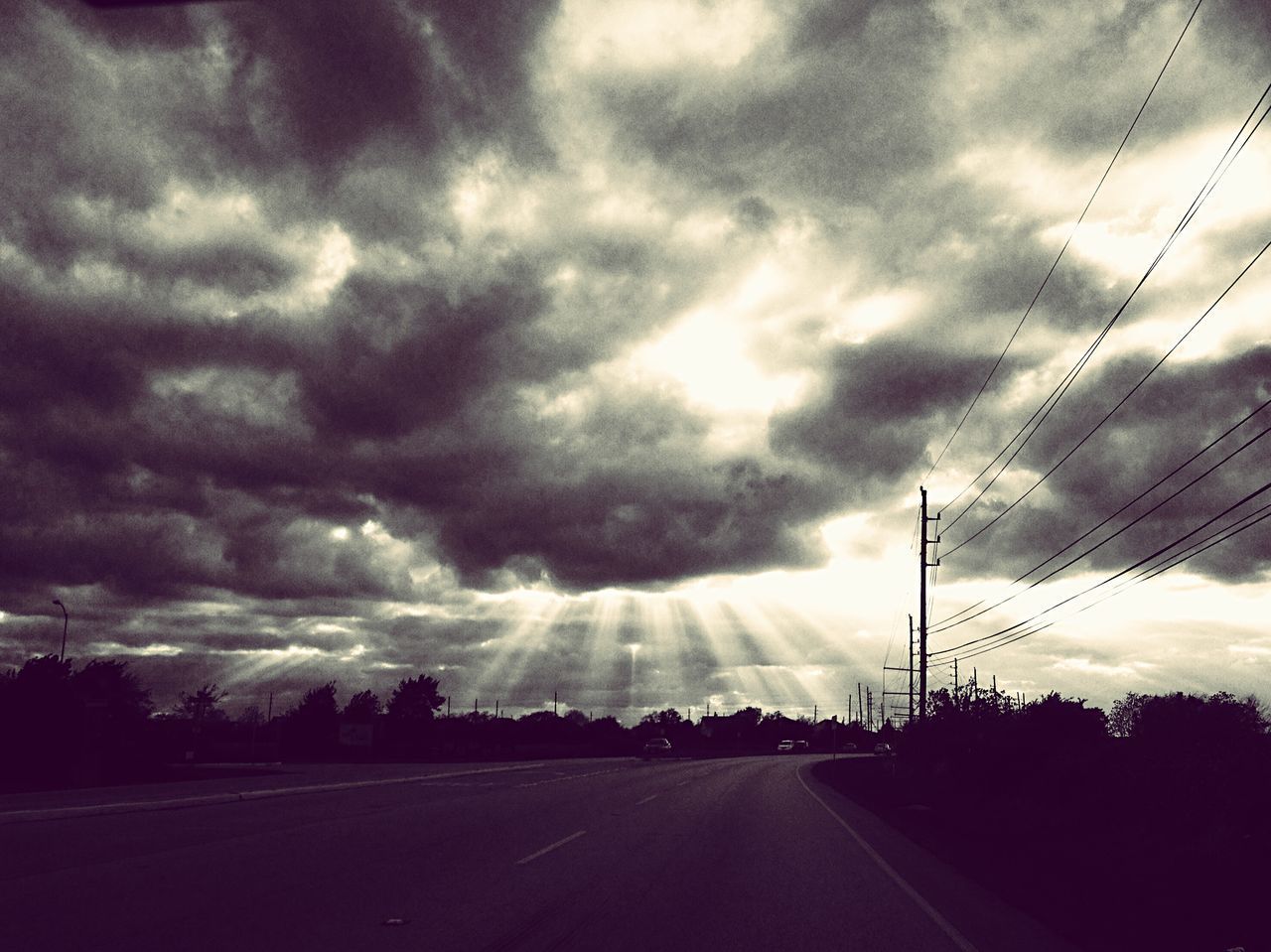 DRAMATIC SKY OVER ROAD