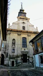 Low angle view of old building against sky