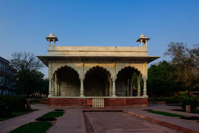 View of historical building against clear blue sky