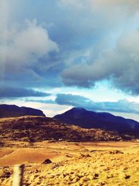 Scenic view of desert against sky