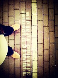 View of people on tiled floor