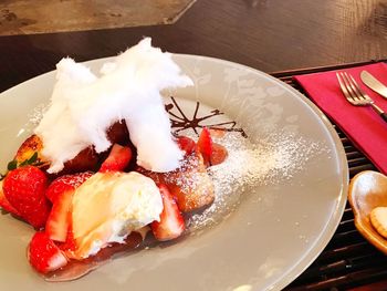Close-up of dessert served on table