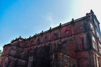 Low angle view of old building against sky