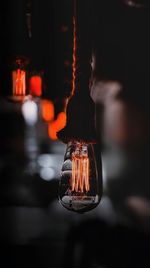 Close-up of illuminated light bulb