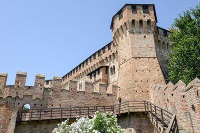 Low angle view of historical building against clear sky