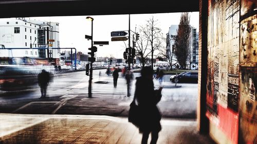 Full length of woman walking in city