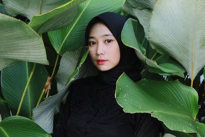 Portrait of a beautiful young woman outdoors