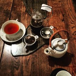 High angle view of coffee cups on table