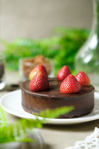 Close-up of strawberries in plate on table