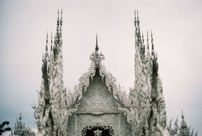 Statue of temple against sky