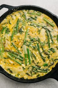 Pre-baked egg and asparagus frittata still life