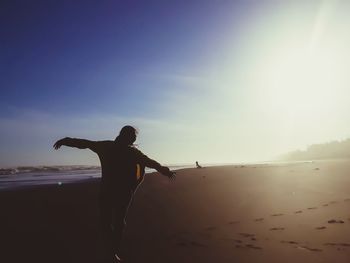 Silhouette of a woman on the beach