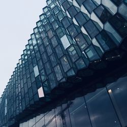 Low angle view of modern building against sky