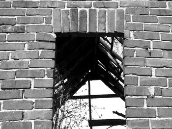 Close-up of window on brick wall