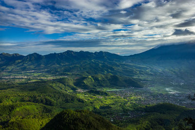 Scenic view of landscape from the mountain against blue sky