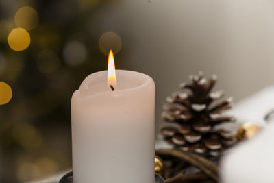 Close-up of burning candle