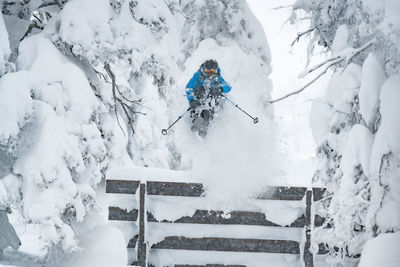 Freeride skier captured mid air in the backcountry, werfenweng, austria.