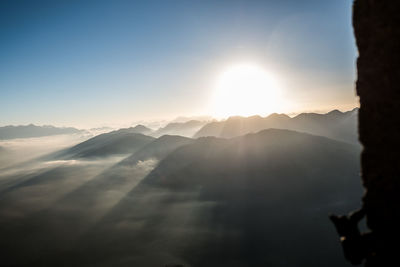 Scenic view of mountains against sky during sunset