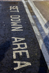 High angle view of text on road
