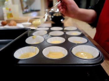 Close-up of person preparing food