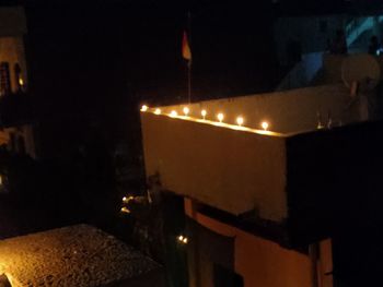 Close-up of illuminated lights at night
