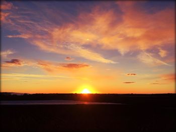 Scenic view of landscape at sunset