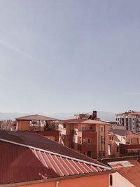 High angle view of buildings against clear sky