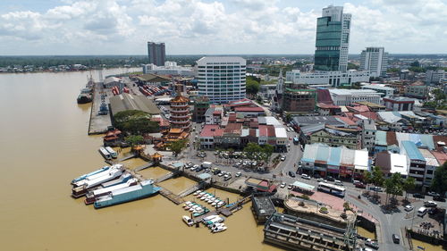 High angle view of buildings against sky in city