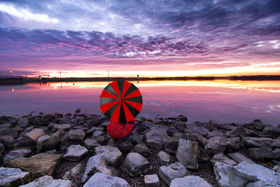 Scenic view of sea against sky at sunset