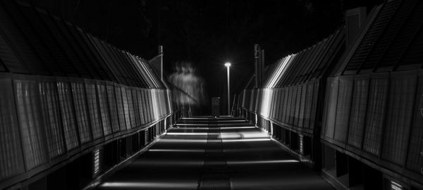 Illuminated staircase at night