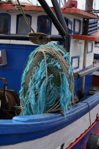 Fishing net in boat at harbor