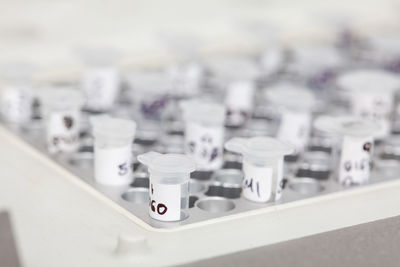 Test tubes at a thermal cycler block in a molecular biology laboratory. polymerase chain reaction