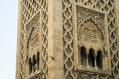 Low angle view of carving on building