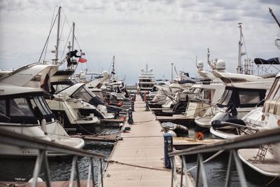 Boats moored at harbor