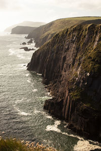 Scenic view of cliffs and sea. against sky.