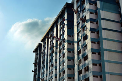 Low angle view of building in city against sky