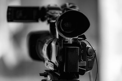 Cameras at a media conference outdoors.