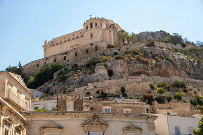 Low angle view of historic building against clear sky