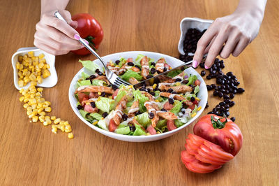 High angle view of woman eating food