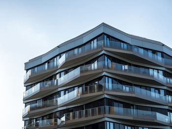 Low angle view of modern building against sky