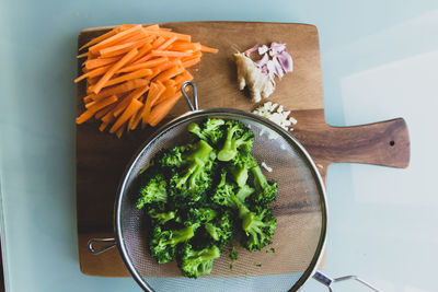 High angle view of chopped vegetables in bowl on table