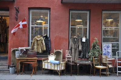 Chairs and tables in illuminated building