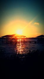 Scenic view of sea at sunset