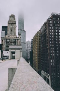 View of buildings in city during winter