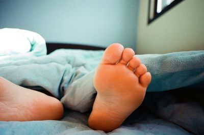 Cute baby sleeping on bed