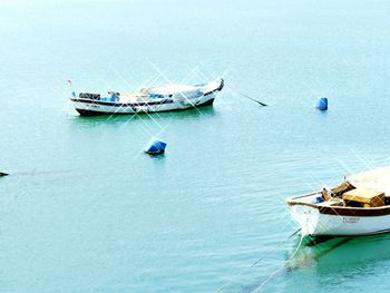 High angle view of boats moored in sea