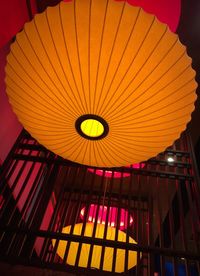 Low angle view of illuminated ceiling