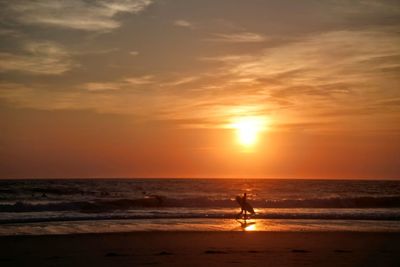 Scenic view of sea during sunset